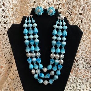 Vintage three tiered blue flower choker necklace and earrings set.